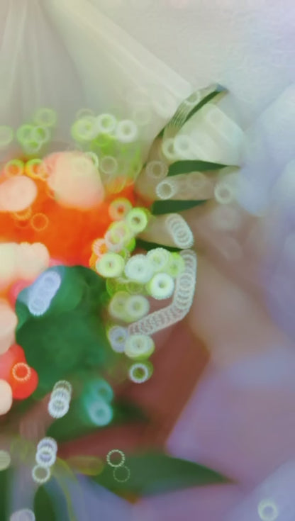 باقة شمع معطر بألوان برتقالية ووردية